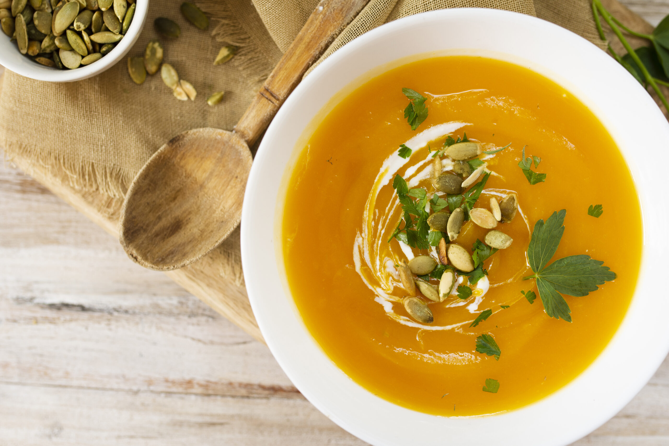 close-up-cream-soup-wooden-spoon
